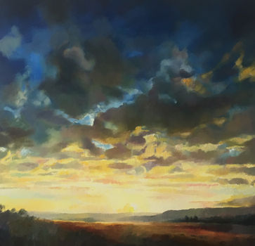 Firey morning skies create a dramatic scene with moorland waking from darkness, deep blue night sky melting away