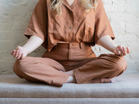 Woman meditating in body awareness practice