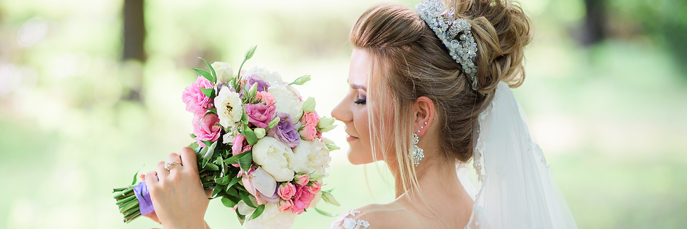 charming-bride-poses-with-colorful-wedding-bouquet-park_cut.png