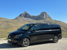 Luxury vehicle driving along Montenegro’s Durmitor Ring.