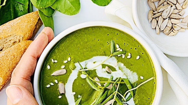 Creamy spinach soup with walnuts & micro greens