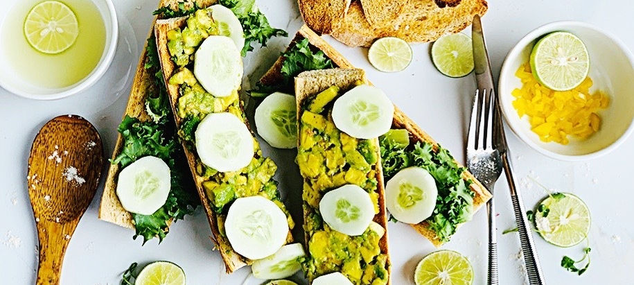 Grilled avacado sandwich with cucumber and micro greens