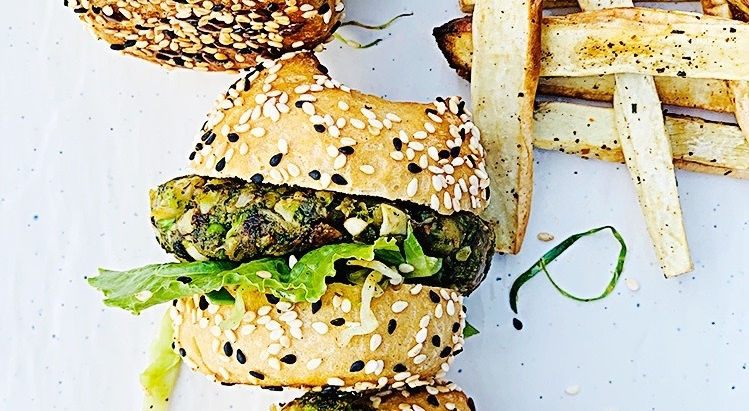 Juicy broccoli and cauliflower burgers with garlic, rosemary & sweet potato fries
