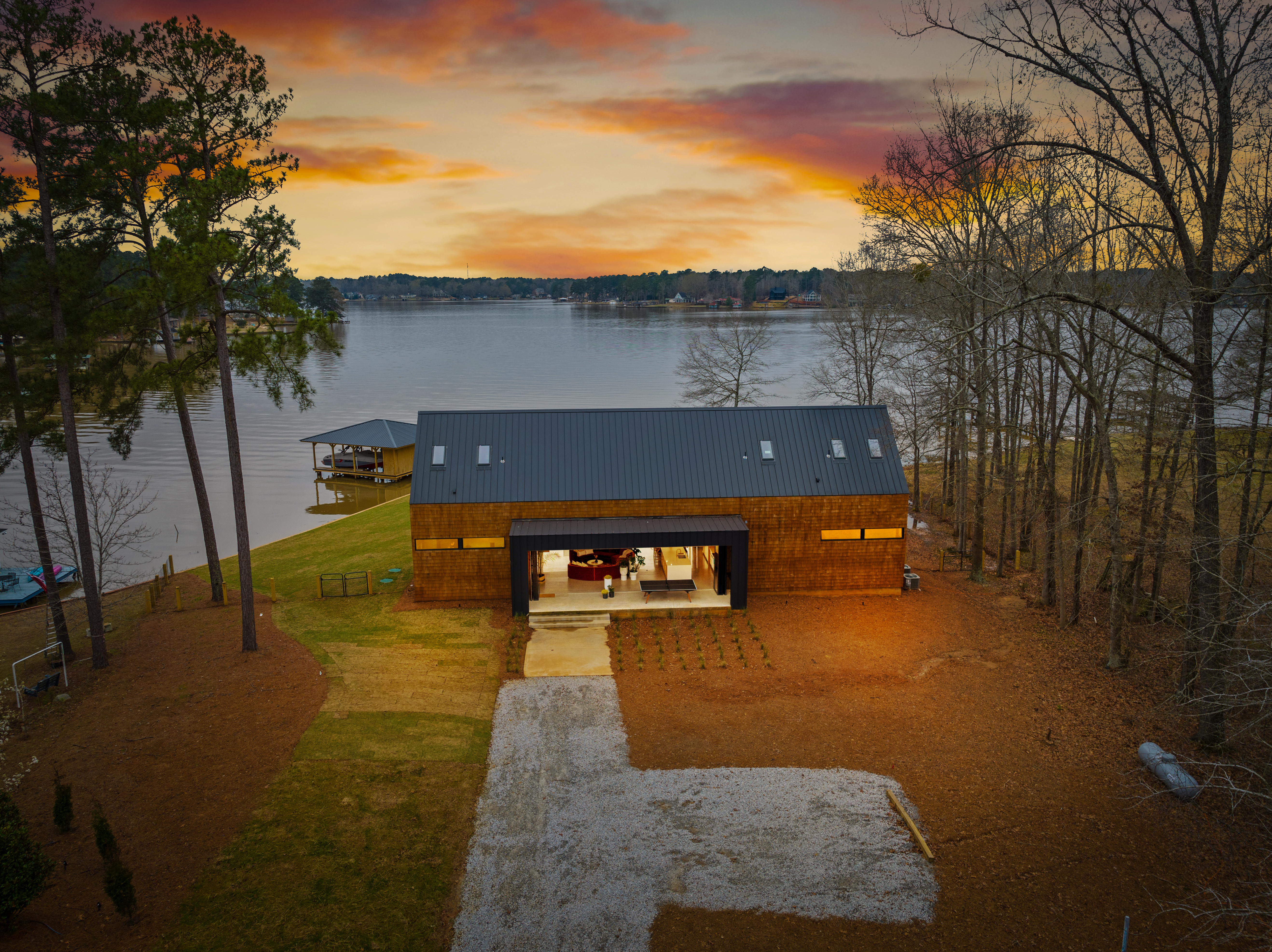 Spa-style bath with lake backdrop