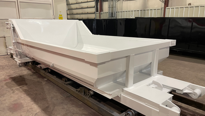 White CCS concrete washout container on production line