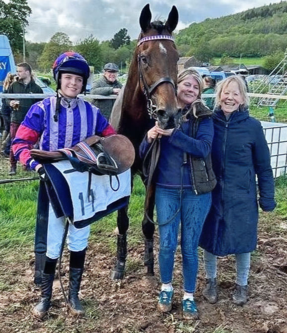 Jelly back in the winner's enclosure with Not A Role Model, with daughter Fern riding and with long-time supporter Caro Mackness