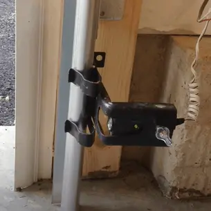 How does a garage door safety sensors work?