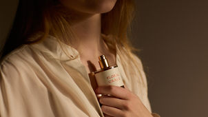 A woman and her cherished Sonia Orts Perfume Floral Grace