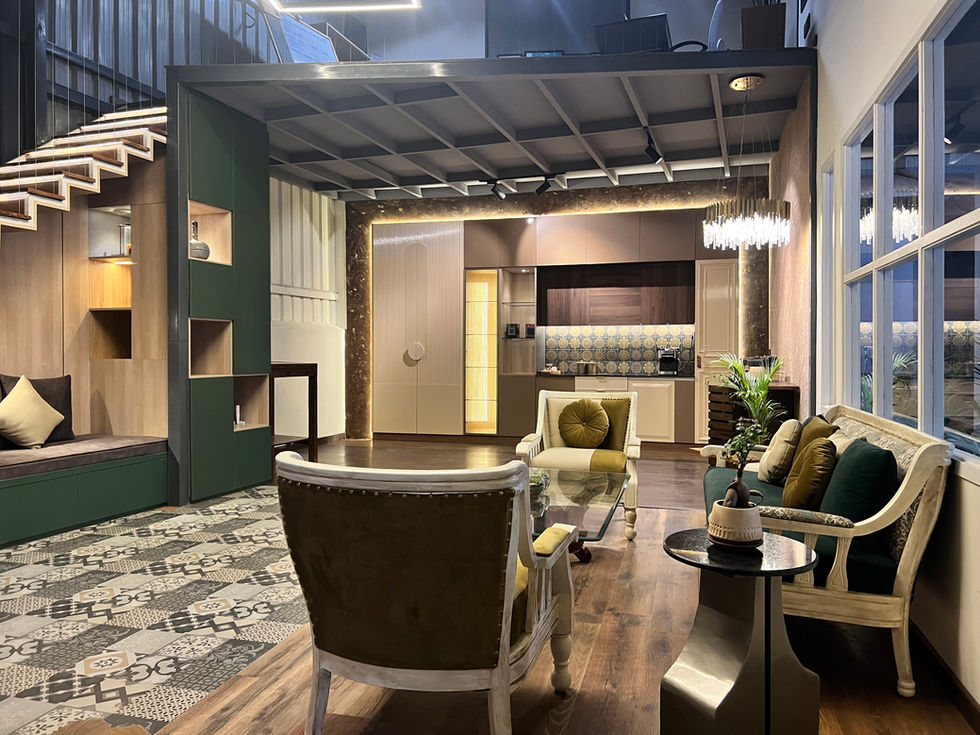 Open floor plan living room featuring a modern staircase with wood treads and stainless steel railing. Large windows with natural light throughout. Upscale design with comfortable furniture in the foreground.