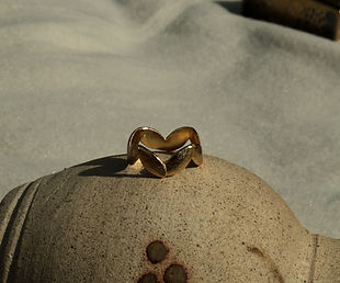 Handmade gold textured pinky finger ring with sculptural wave form and unique texture