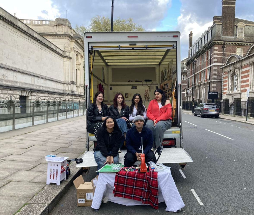 WAHBYWT collective photographed by the exhibition truck.