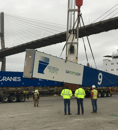 Port Container Crane being loaded on an extendable mutli axle trailer at the Port for the Garden City Terminal Crane Expansion