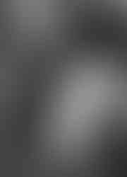 A bride and groom walking towards the camera