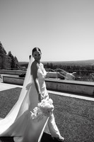 bride walking and smiling for photo