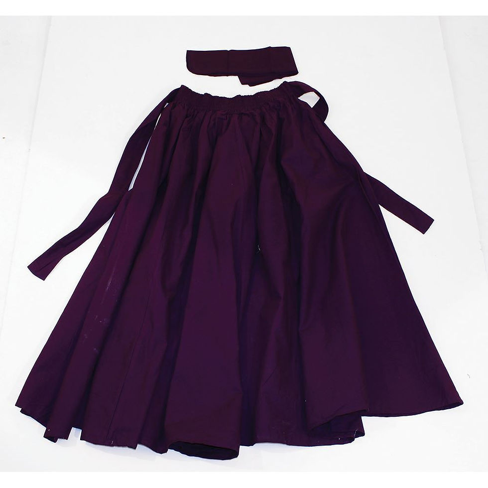 Thumbnail: Maxi Skirt. The long, flowing skirt is available in black, blue and purple. It has two convenient pockets and it comes with a