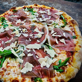 Proscuitto Arugula Pizza.jpeg