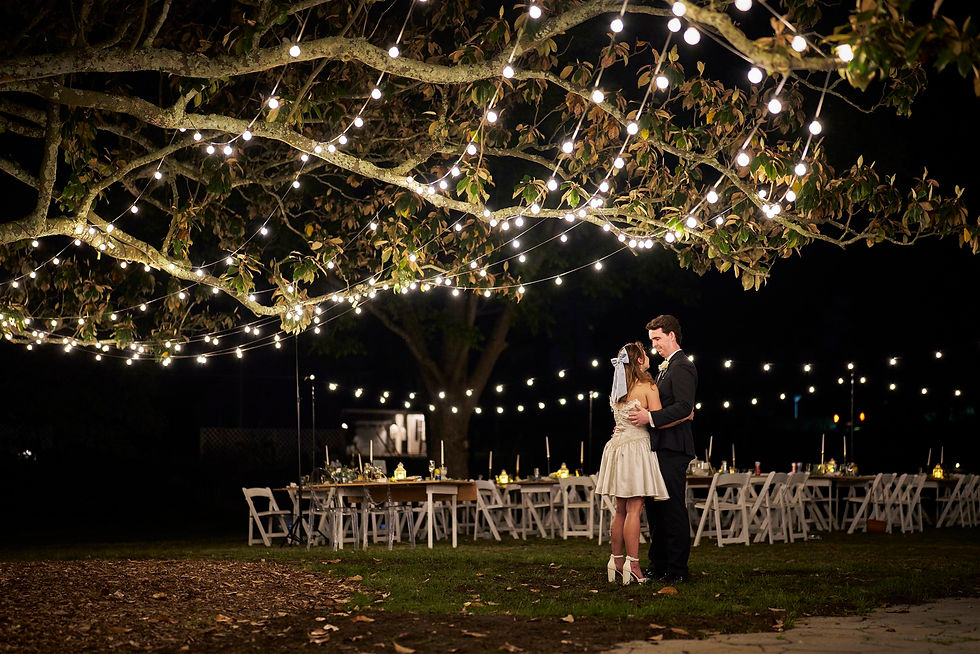Beautifully decorated outdoor wedding reception space.