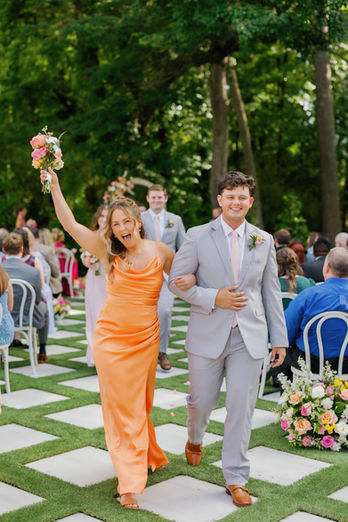 Bridal party posing at wedding venue The Greenhouse at Arrows Farm in Lillington, NC | Total Weddings