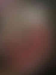 close up back view of white crackle glazed mini sacred heart sculpture to show the metal hook for wall hanging.