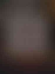 Circular print in square white and black mount, anatomical lungs in fine white outline and colourful florals.