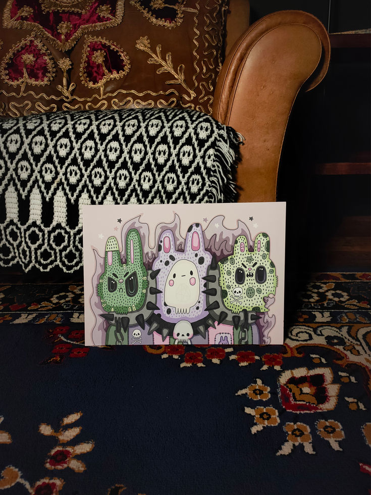 Pastel goth, creepy-cute art green and purple are print of three-headed Cerberus bunny
