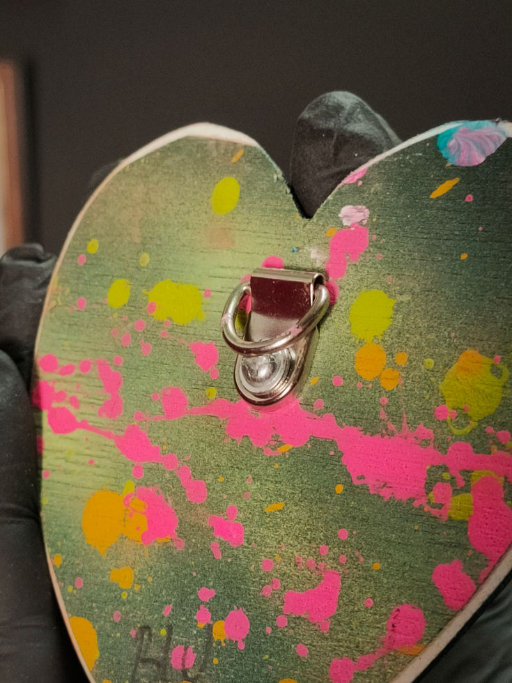 close up of metal hook for hanging on the back of mini heart vision sculpture