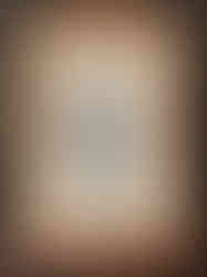 wooden frame, old book page, frayed denim patch, white embroidered ghost holds alternating pink and red heart bunting