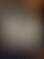 Close up of pastel goth, creepy-cute art green and purple are print of three-headed Cerberus bunny