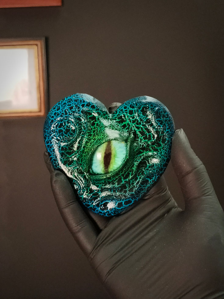 Blue/green variant of mini heart vision sculpture