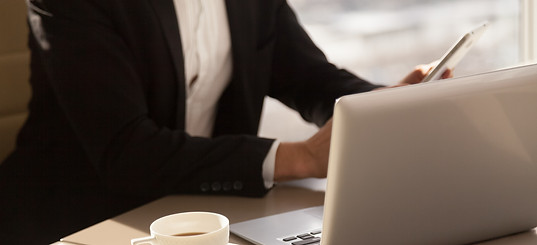 businessman-using-mobile-phone-coffee-break.jpg