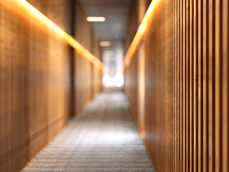 Close-up of engraved timber surface showing refined texture and natural grain variation