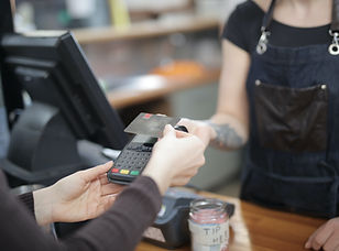 person-holding-credit-card-3907161.jpg