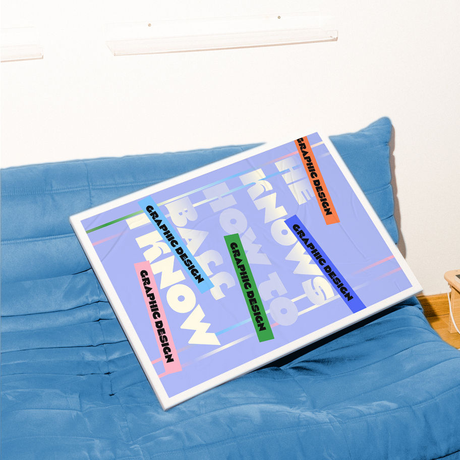 Poster on blue sofa says I KNOW BACK KNOW SHE KNOWS Graphic Design.