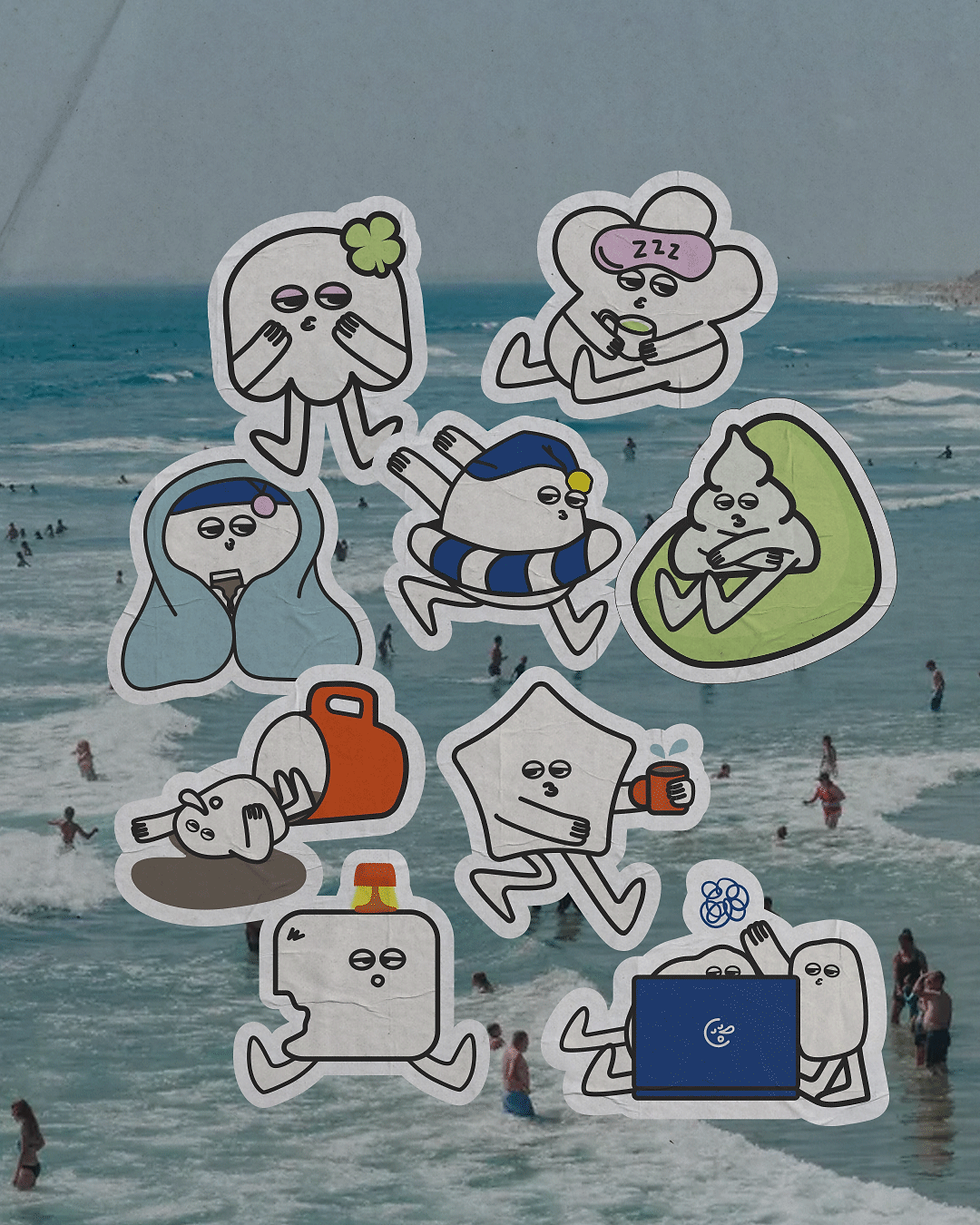 Collection of quirky stickers on the beach, featuring creative cartoon characters 