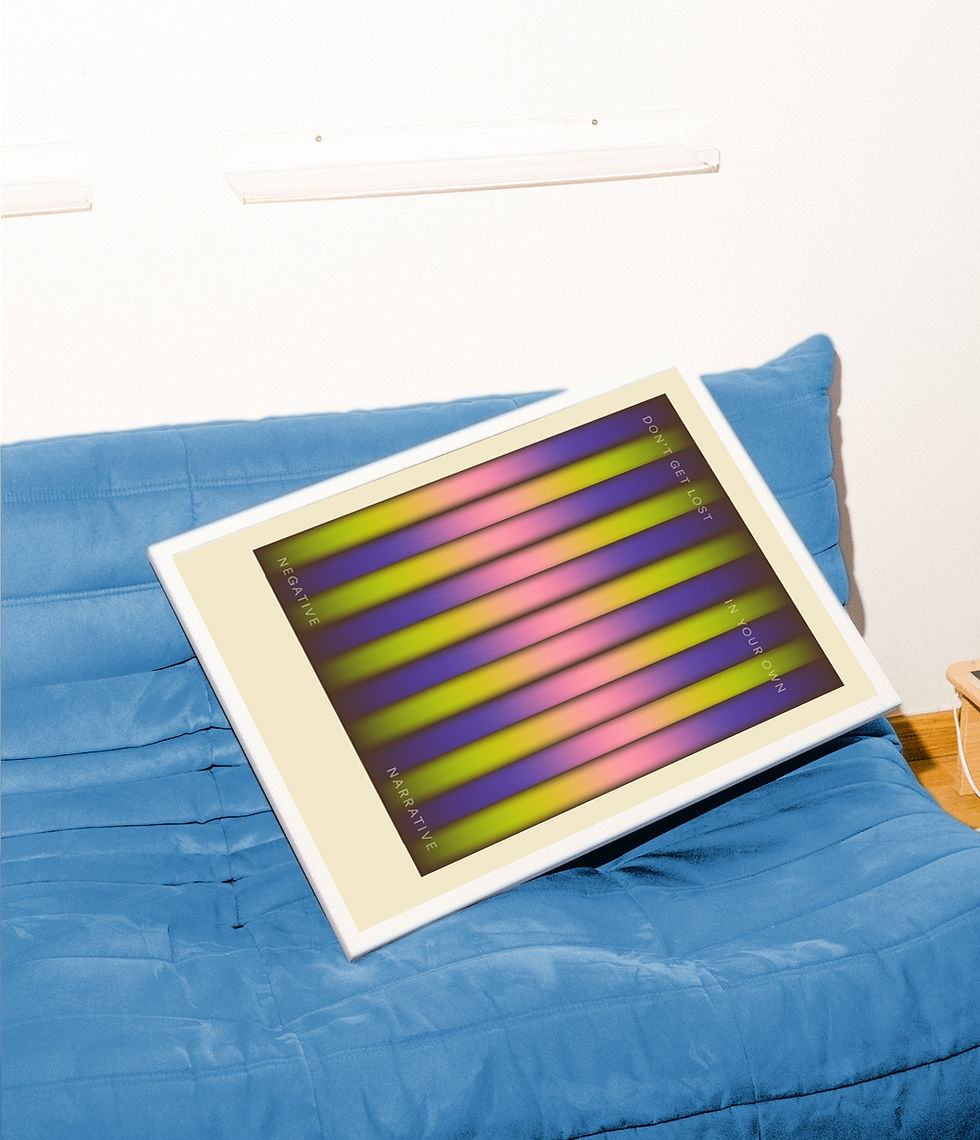 Abstract art print on a blue couch with lines and colors indoors