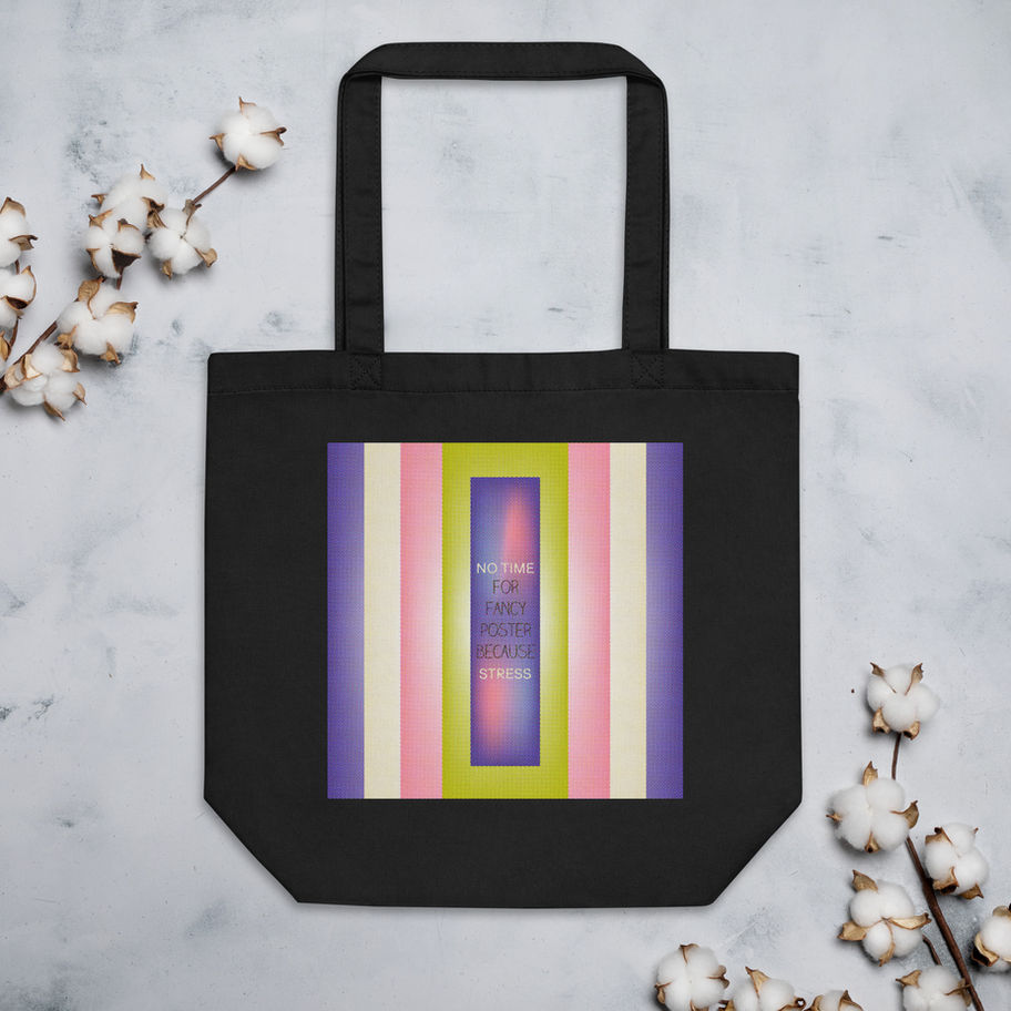 Black tote bag with colorful vertical stripes and visible text; Gradient Pattern Pack.