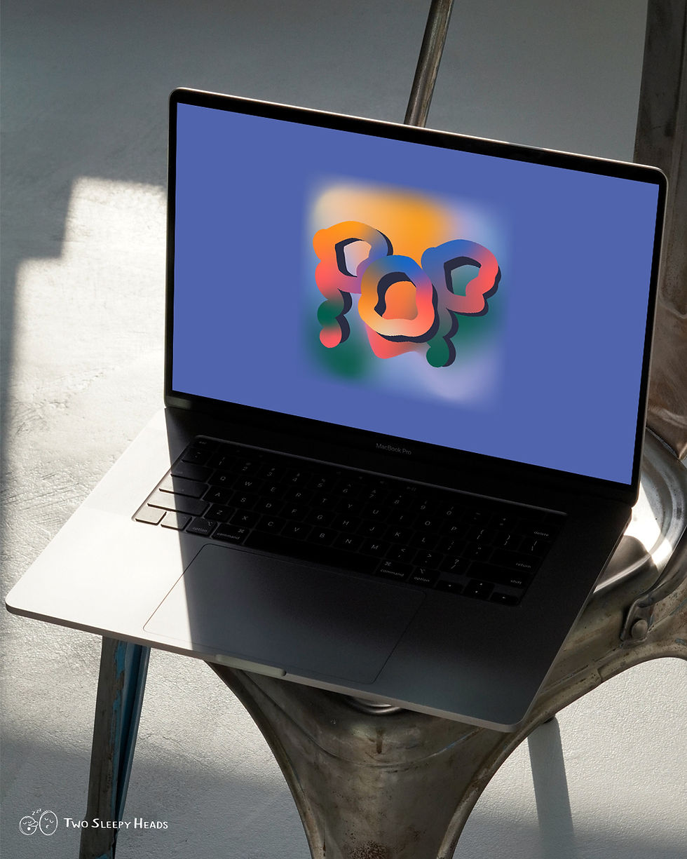 Laptop computer on metal chair displaying colorful art, sunlight, and modern design.