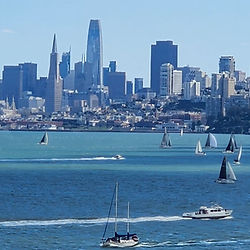 San Francisco skyline with sailboats crossing the bay