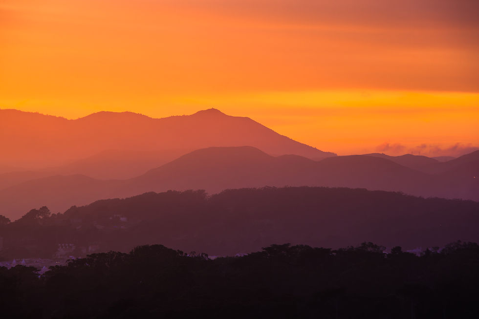 Sunset over Mount Tamalpais silhouette with orange and purple sky