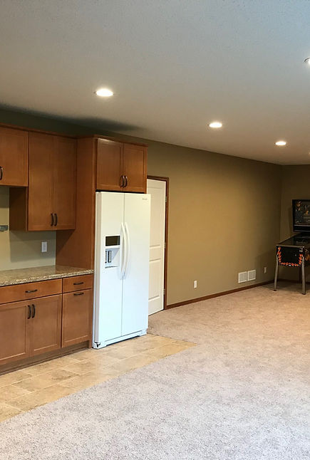 A spacious living room constructed by a home addition builder.