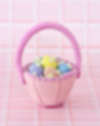 Small pink wool felt Easter basket with daisy-decorated felt eggs
