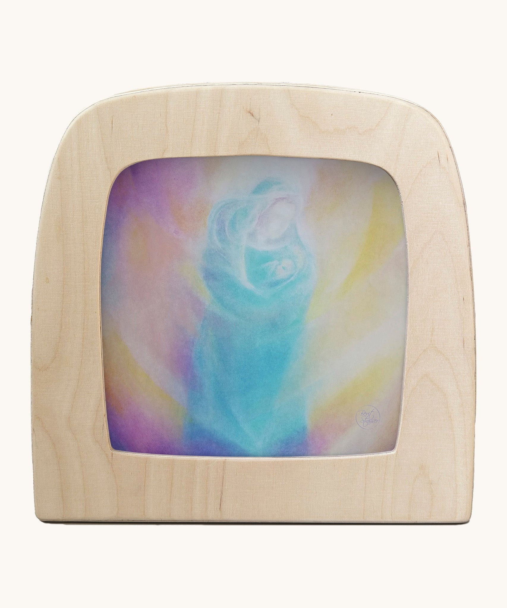 Toverlux silhouette "Lightborn" by Berit Strasser, featuring a mother holding a child in glowing teal and yellow tones.