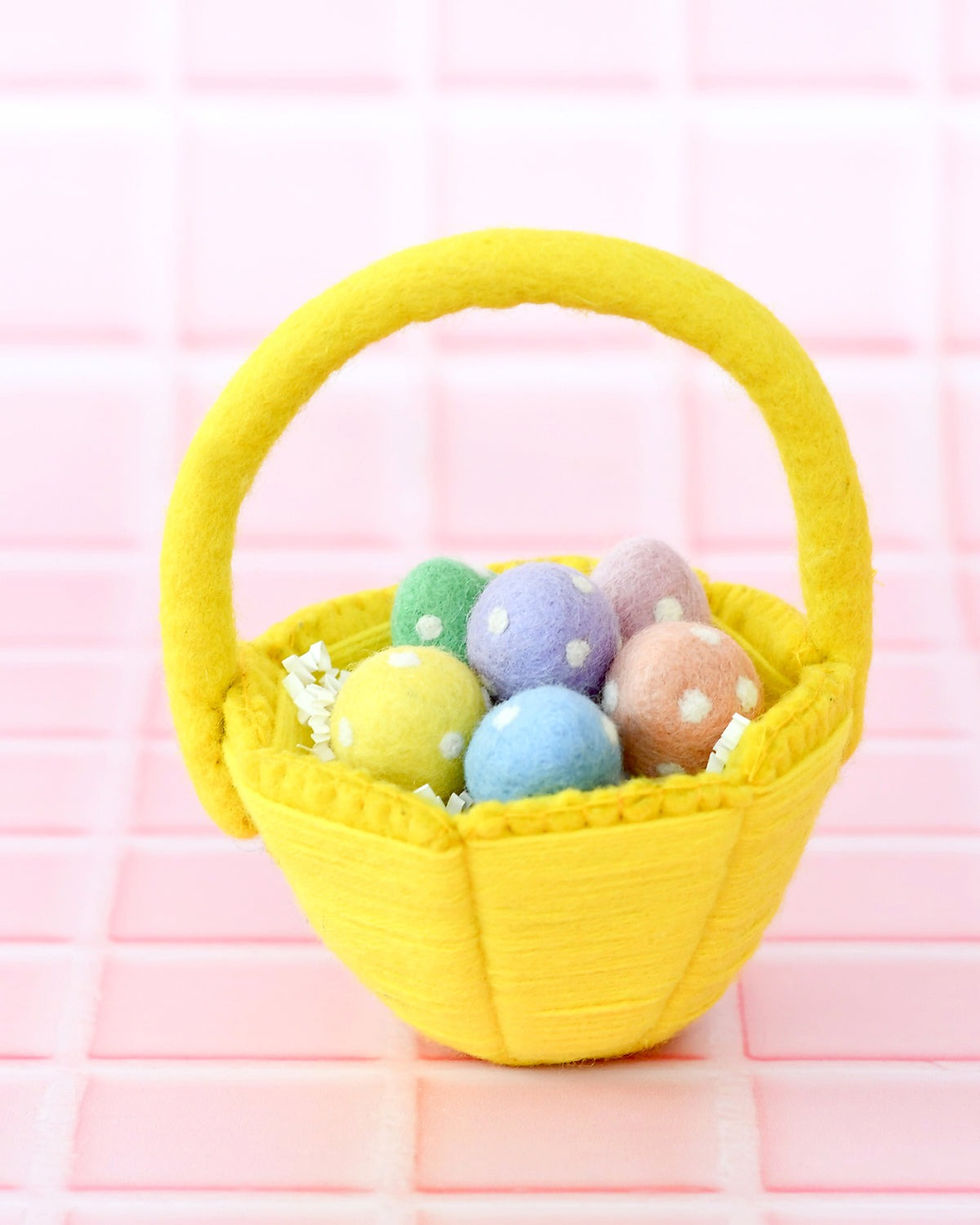 Small yellow felt Easter basket with pastel felt eggs for children
