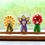 Thumbnail: Tara Treasures Floral Peg Dolls Set - Sunflower, Iris and Toadstool