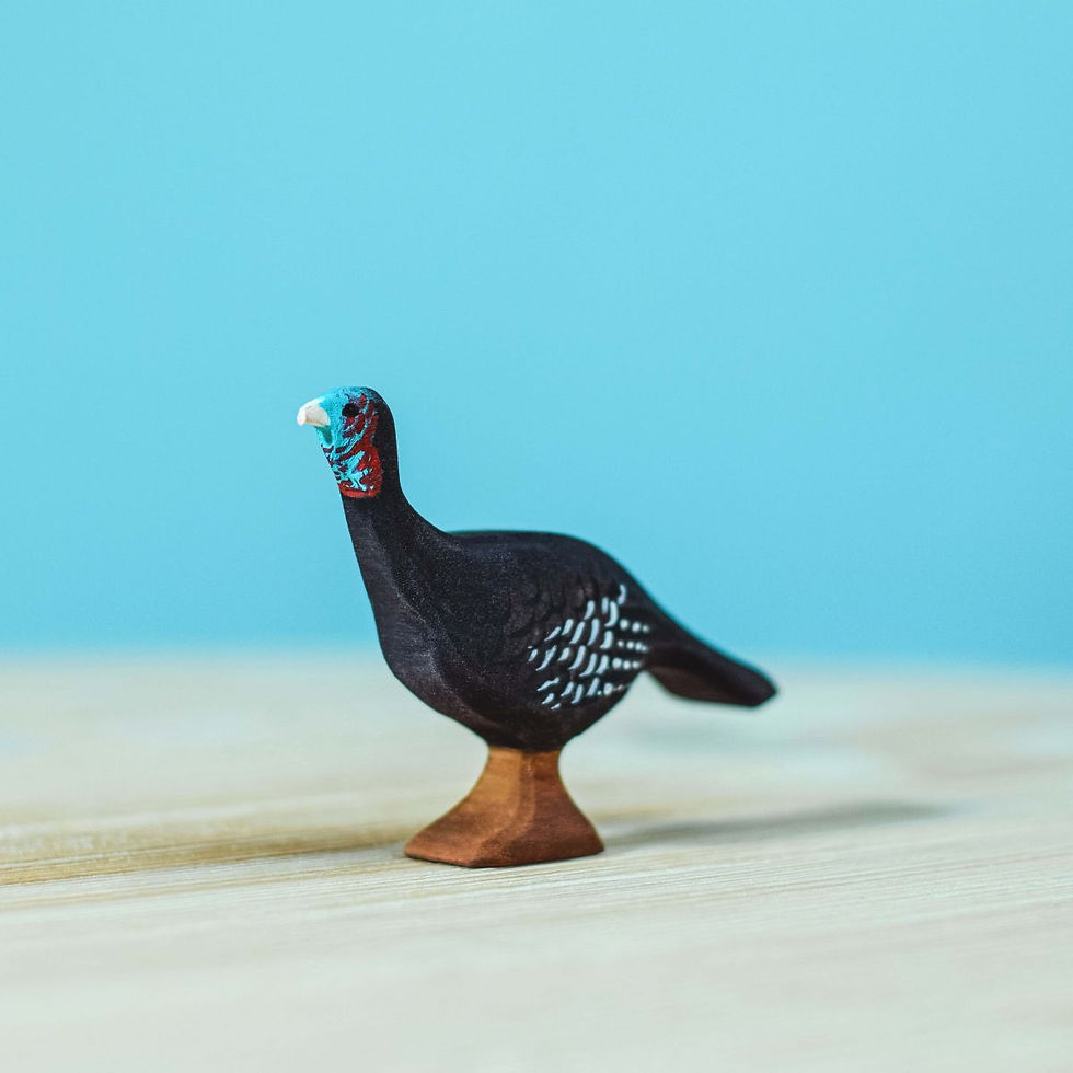 Thumbnail: Bumbu Toys Handmade Wooden Turkey Hen Figurine on a wooden surface