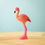 Thumbnail: Handmade Wooden Bumbu Flamingo Figurine Toys on a wooden surface