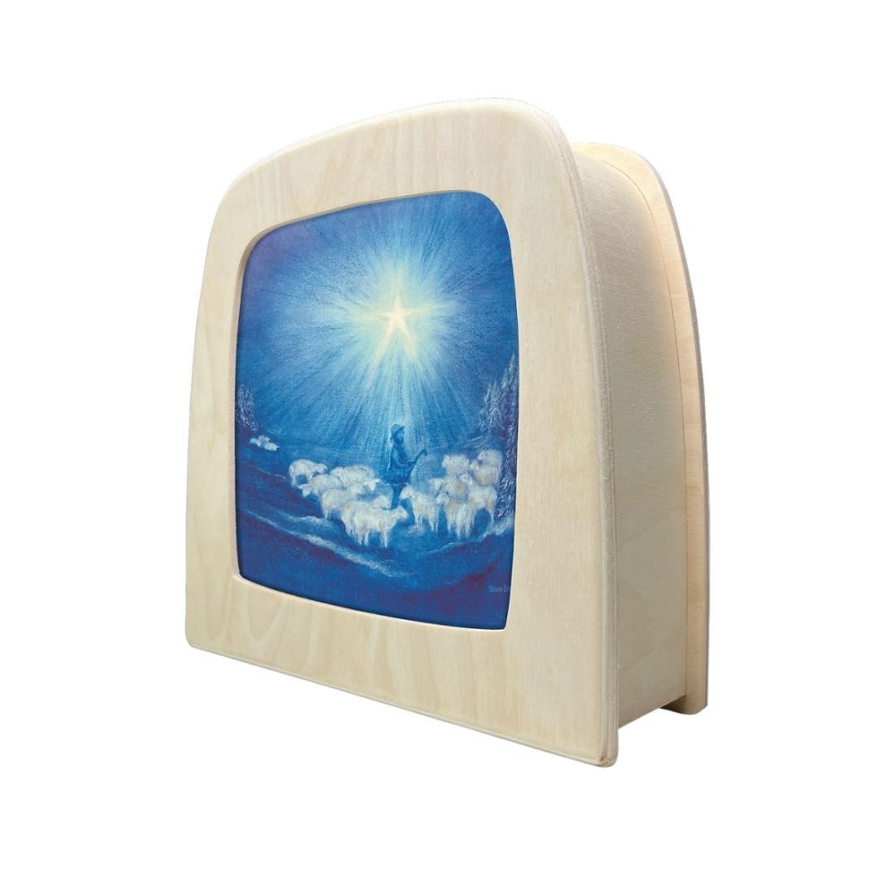 Toverlux Guiding Star silhouette illuminated in a frame showing a shepherd and sheep under a bright glowing star.