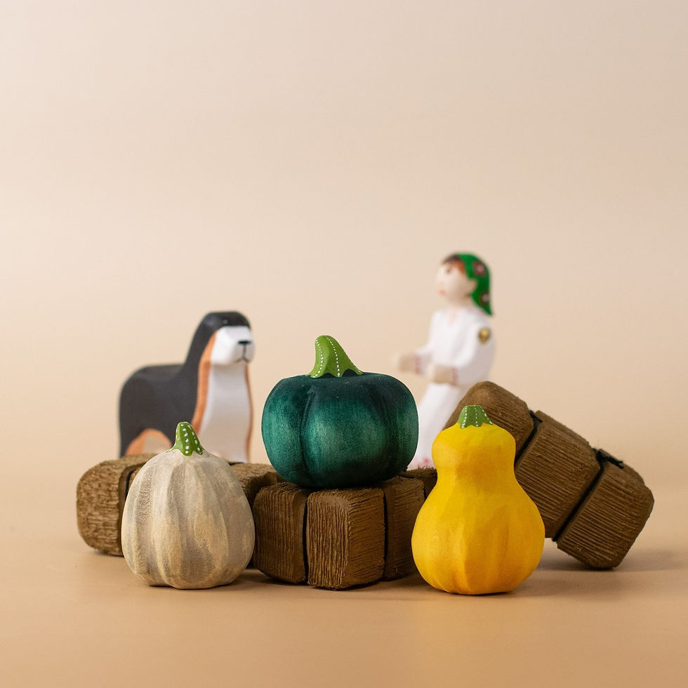 Thumbnail: Bumbu Toys Wooden Pumpkin Patch Set – Yellow, Green, Grey Pumpkins in a small world play scene.