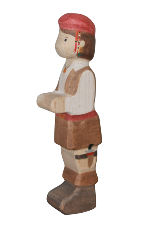 Side view of Batang Kahoy Wooden Jewel pirate figure with red cap, beaded hair extensions, and leg dagger. Maple wood.