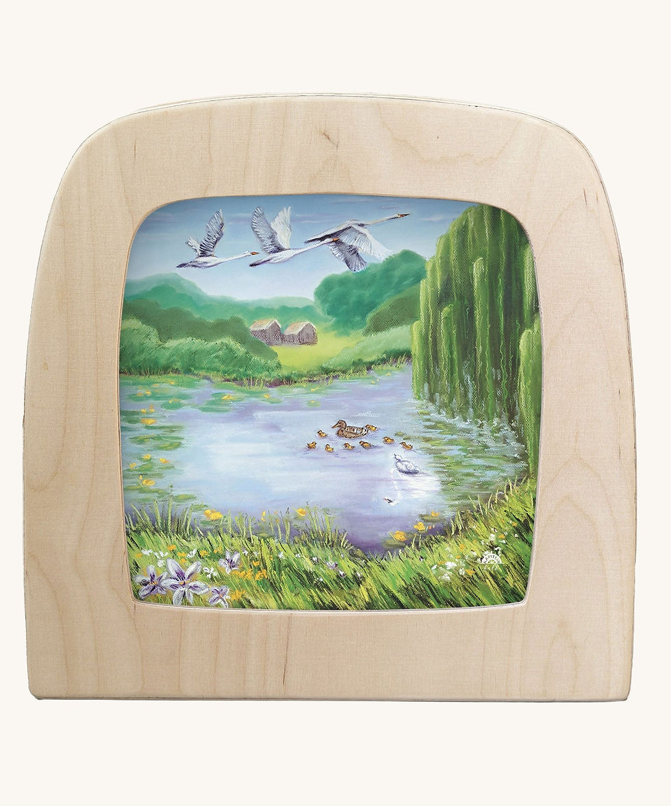 Toverlux silhouette by Kapitein Kalk showing a duck with ducklings on a pond under a willow tree with flying swans.